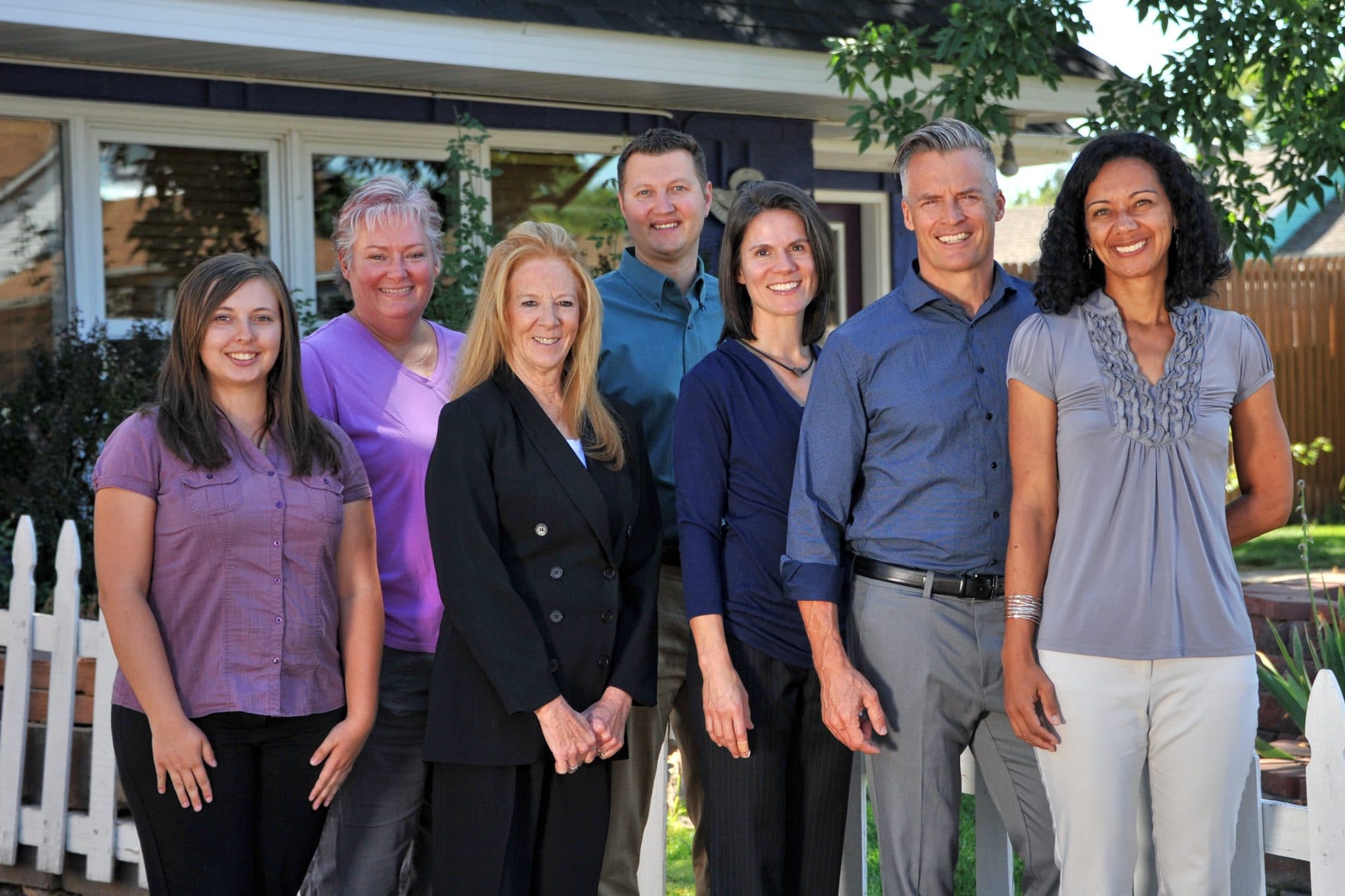 Group photo of The Chiropractic Center of Erie and Chiropractic Center of Longmont Team
